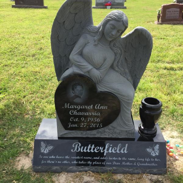 This is another example of a single upright monument. This one shows just how much you can personalize your loved one's monument.